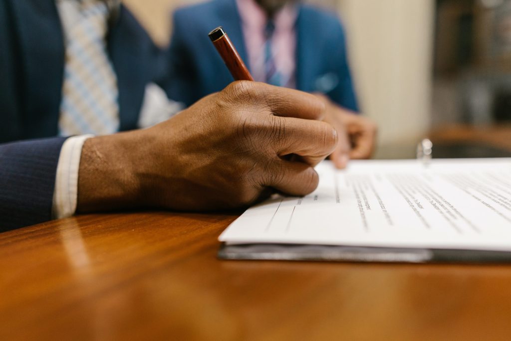 Man signing contract