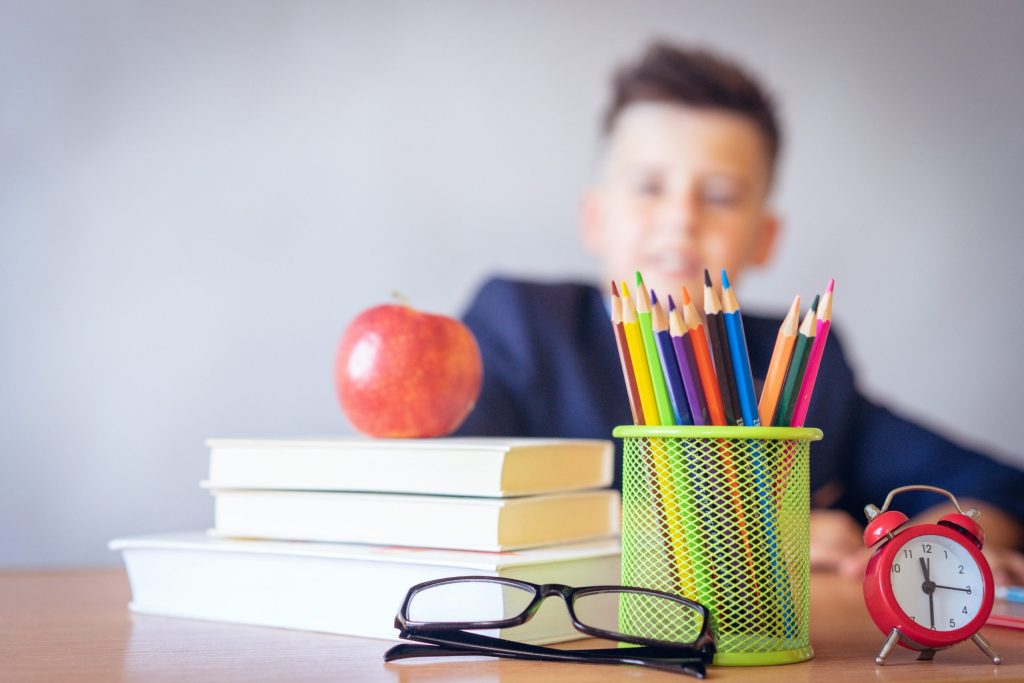 Boy sitting in a school desk